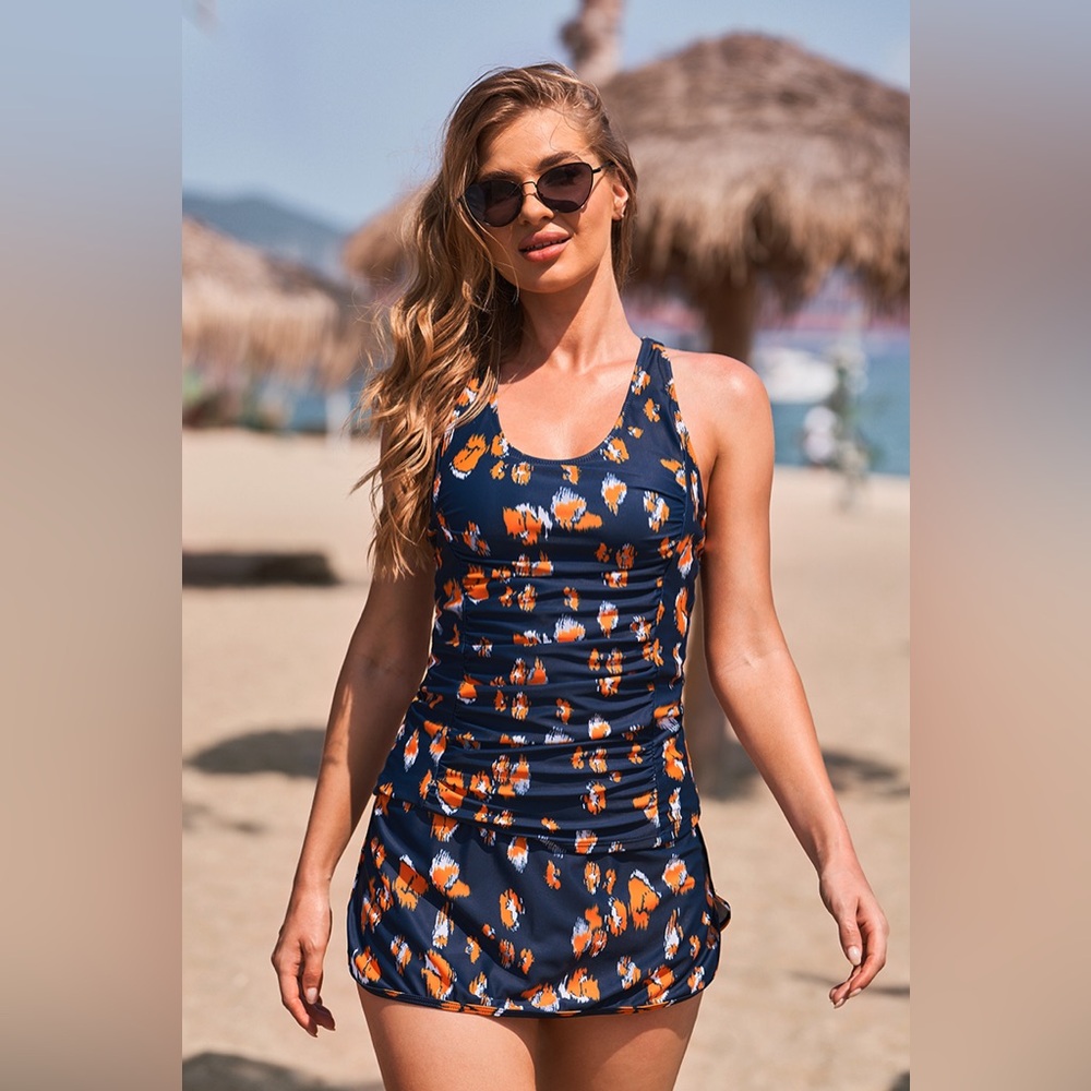 Navy and orange leopard print skirted tankini set